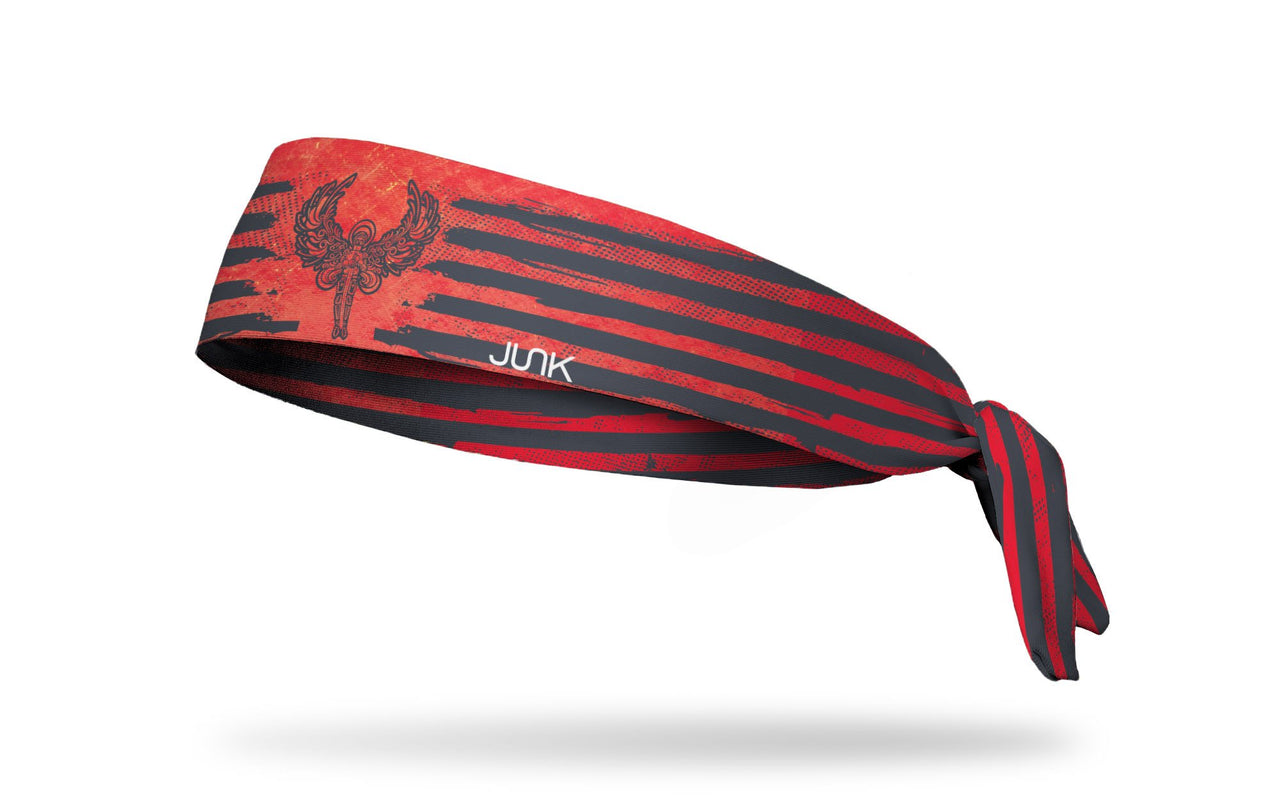 red headband with paint lines and archangel Michael as a knight in grey