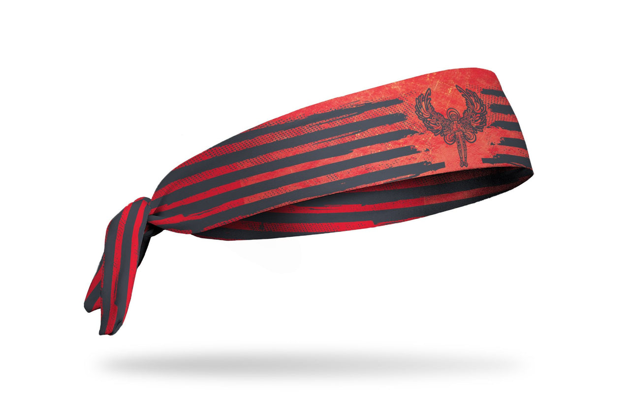 red headband with paint lines and archangel Michael as a knight in grey