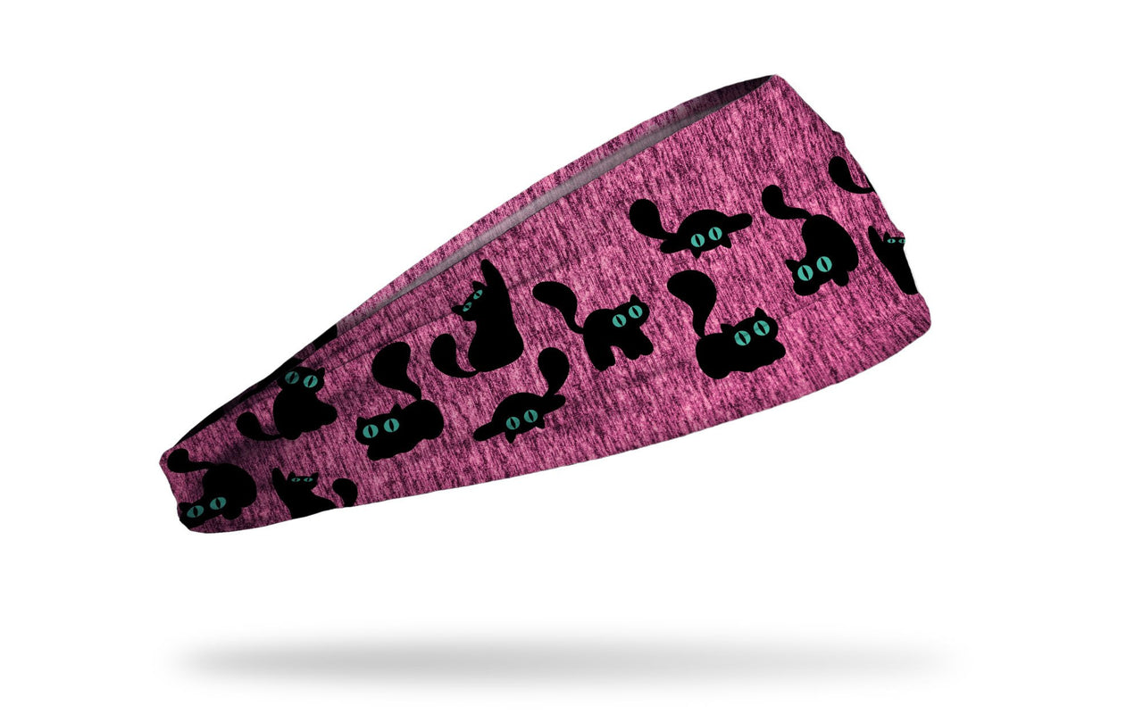 cat themed pink headband with black cats pouncing pattern