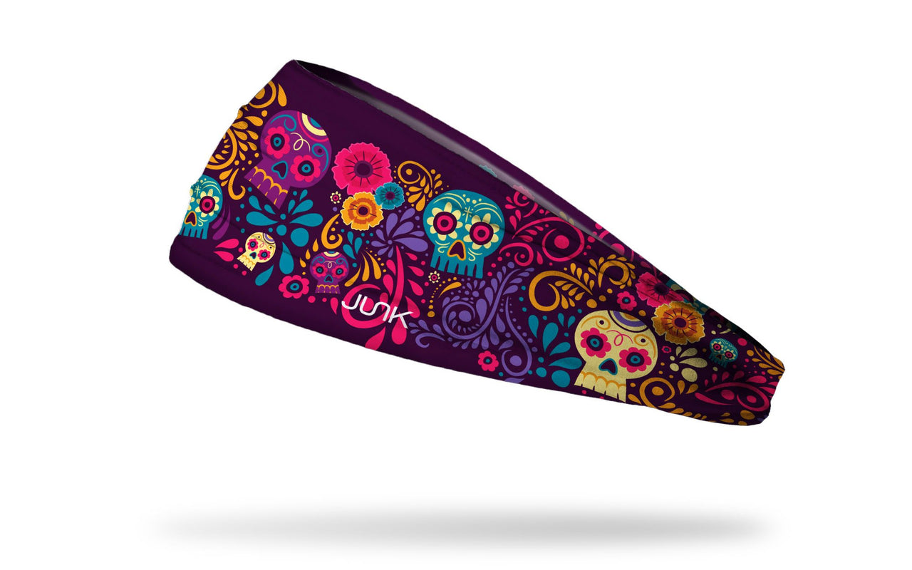 dark purple headband with turquoise cream gold and bright pink floral accents and sugar skulls