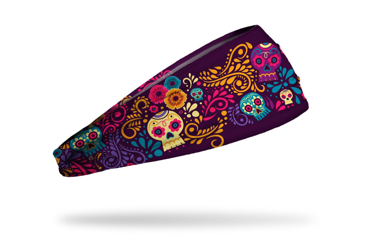 dark purple headband with turquoise cream gold and bright pink floral accents and sugar skulls