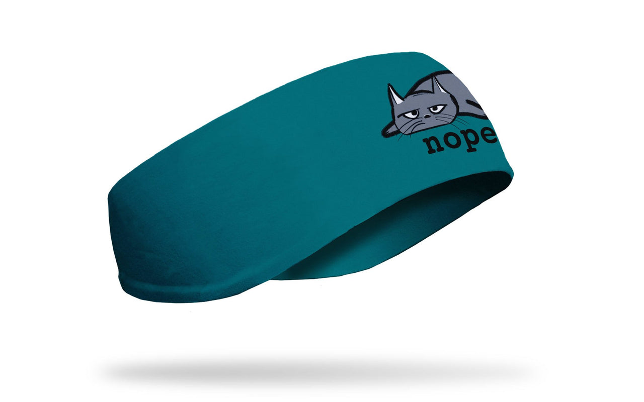 cat themed ear warmer with a grey tired cat and the wordmark nope.