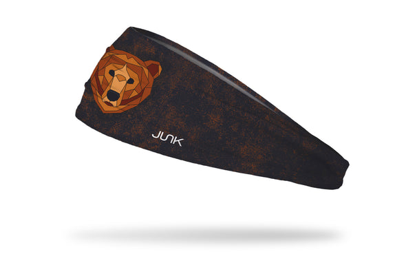 black and brown print headband with geometric bear in center