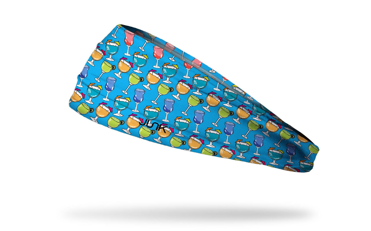 blue headband with repeating pattern of colorful glasses with umbrellas and limes