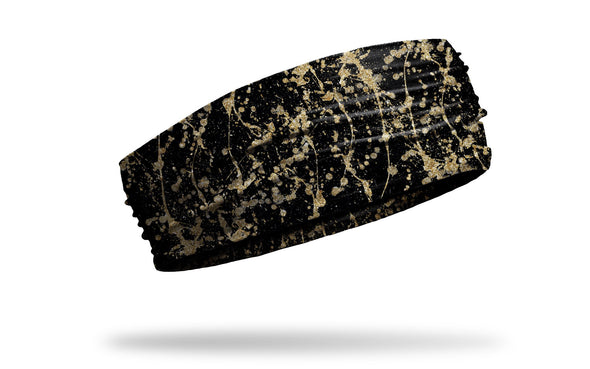 black headband with gold paint splatter and drip design
