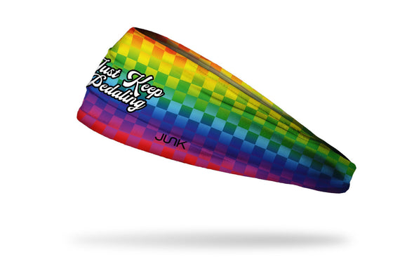 checkered rainbow fade print with cursive Just Keep Pedaling wordmark