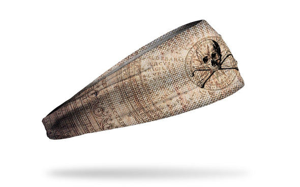 faded khaki headband with map design and skull and crossbones in middle