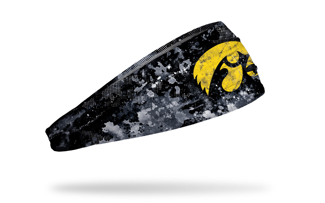 black headband with University of Iowa hawkeye logo in yellow with white grunge overlay