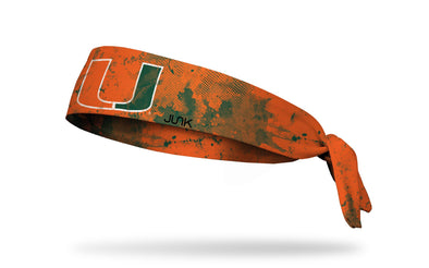 University of Miami orange headband with green grunge overlay