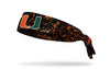 University of Miami black headband with orange paint splatter
