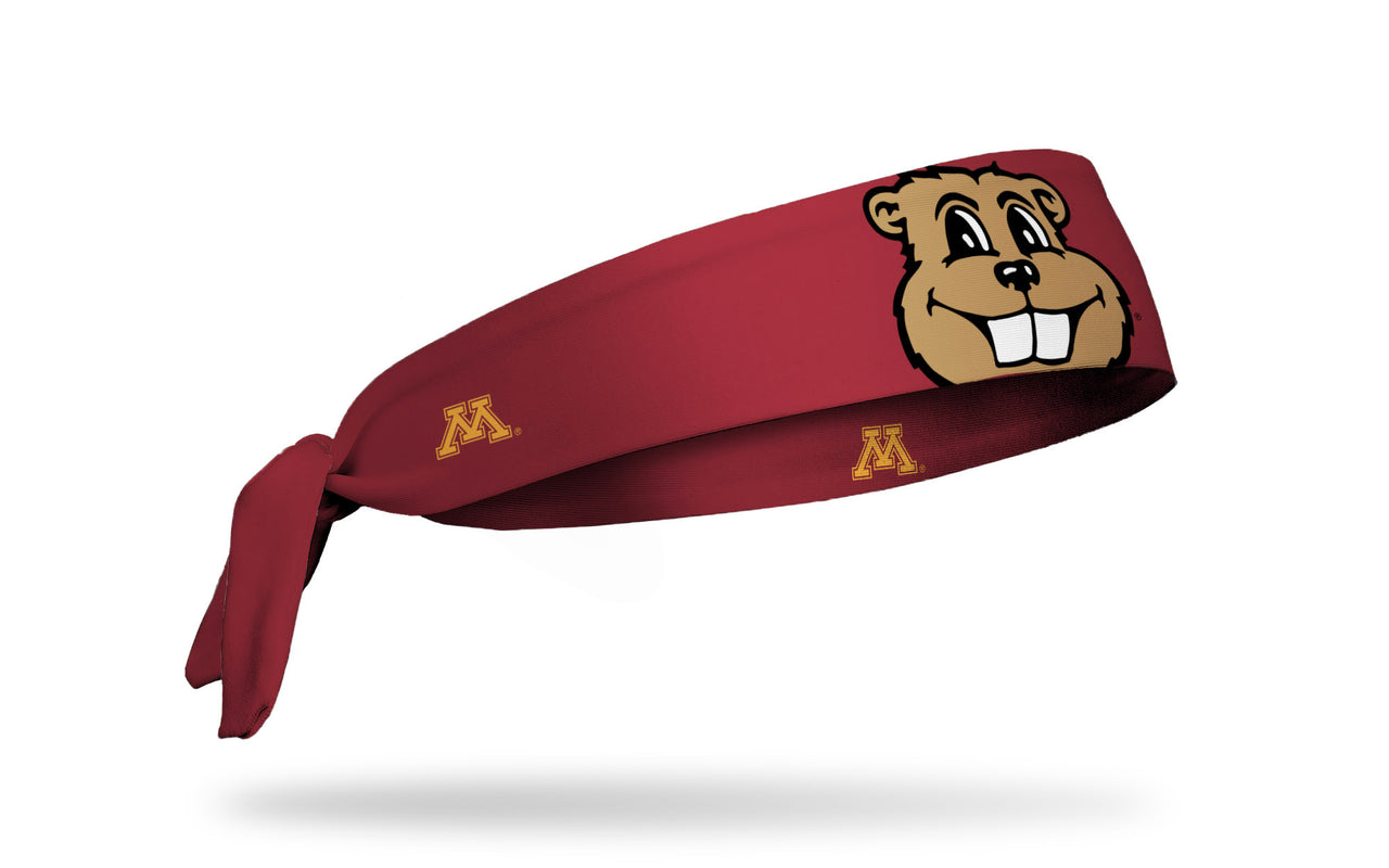 Maroon headband with University of Minnesota mascot Goldy oversized face view in full color