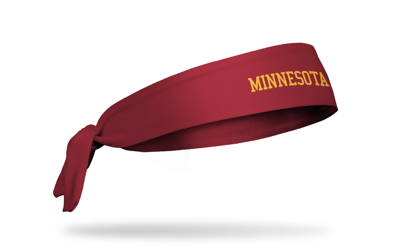 maroon headband with University of Minnesota Minnesota wordmark in gold