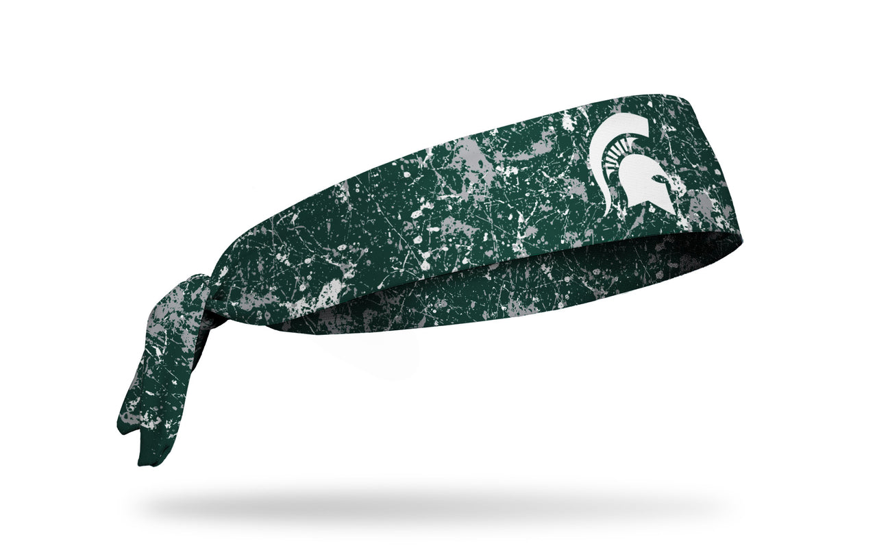 green paint splatter headband with Michigan State University spartan logo in white