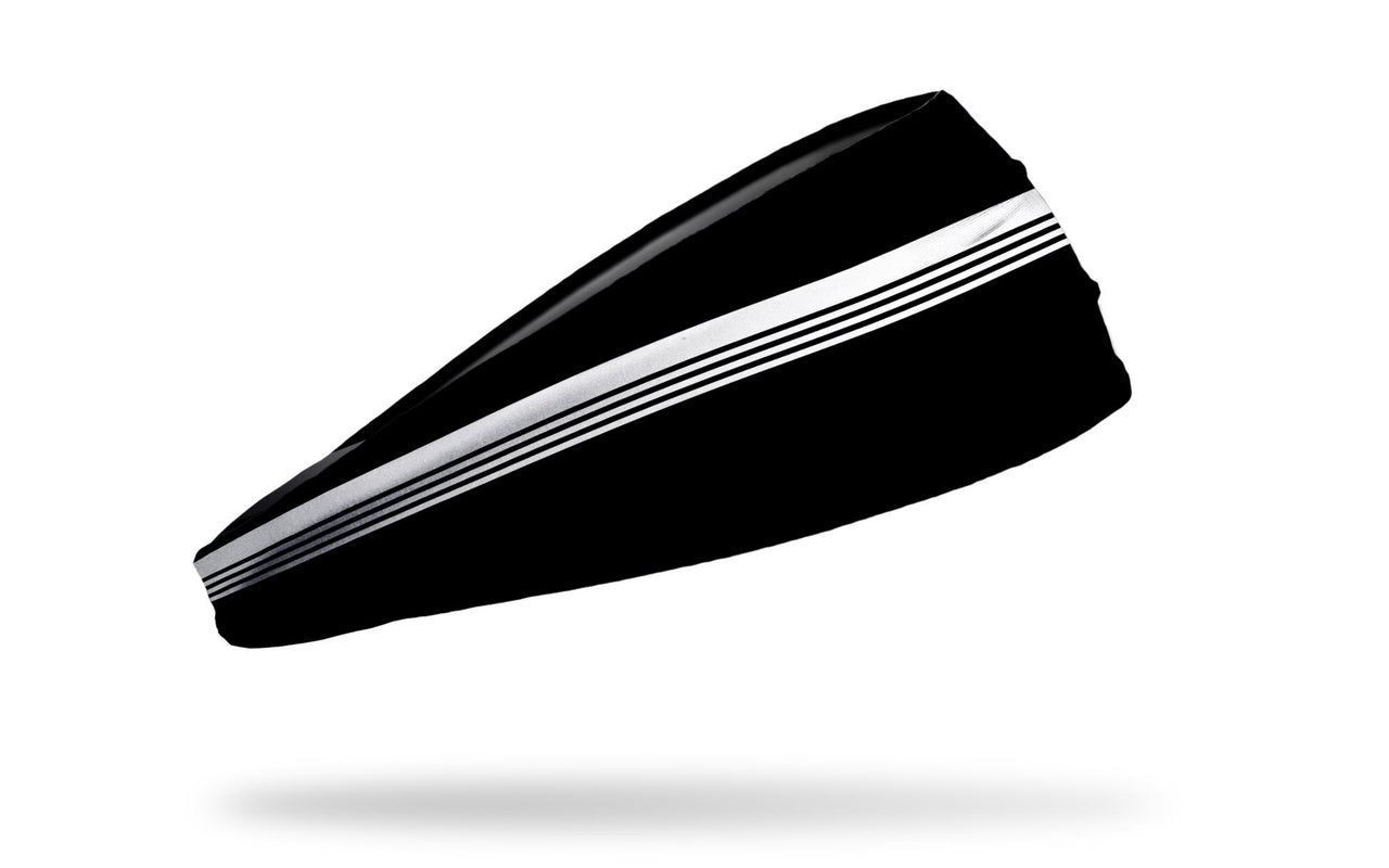 black headband with white varsity stripes through middle