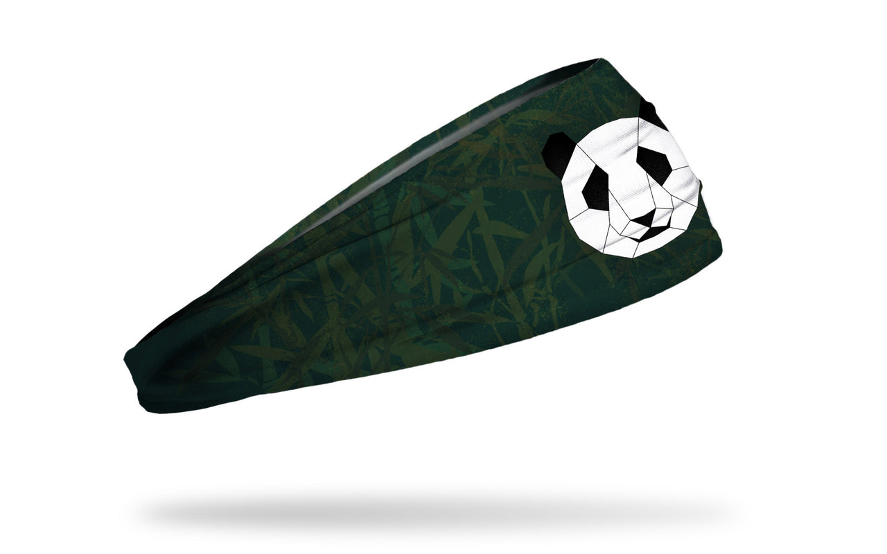 dark green and dark grey bamboo leaf print headband with geometric panda in center