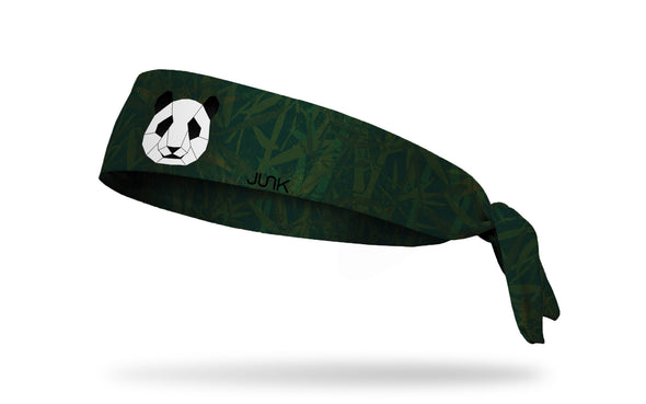 dark green and dark grey bamboo leaf print headband with geometric panda in center