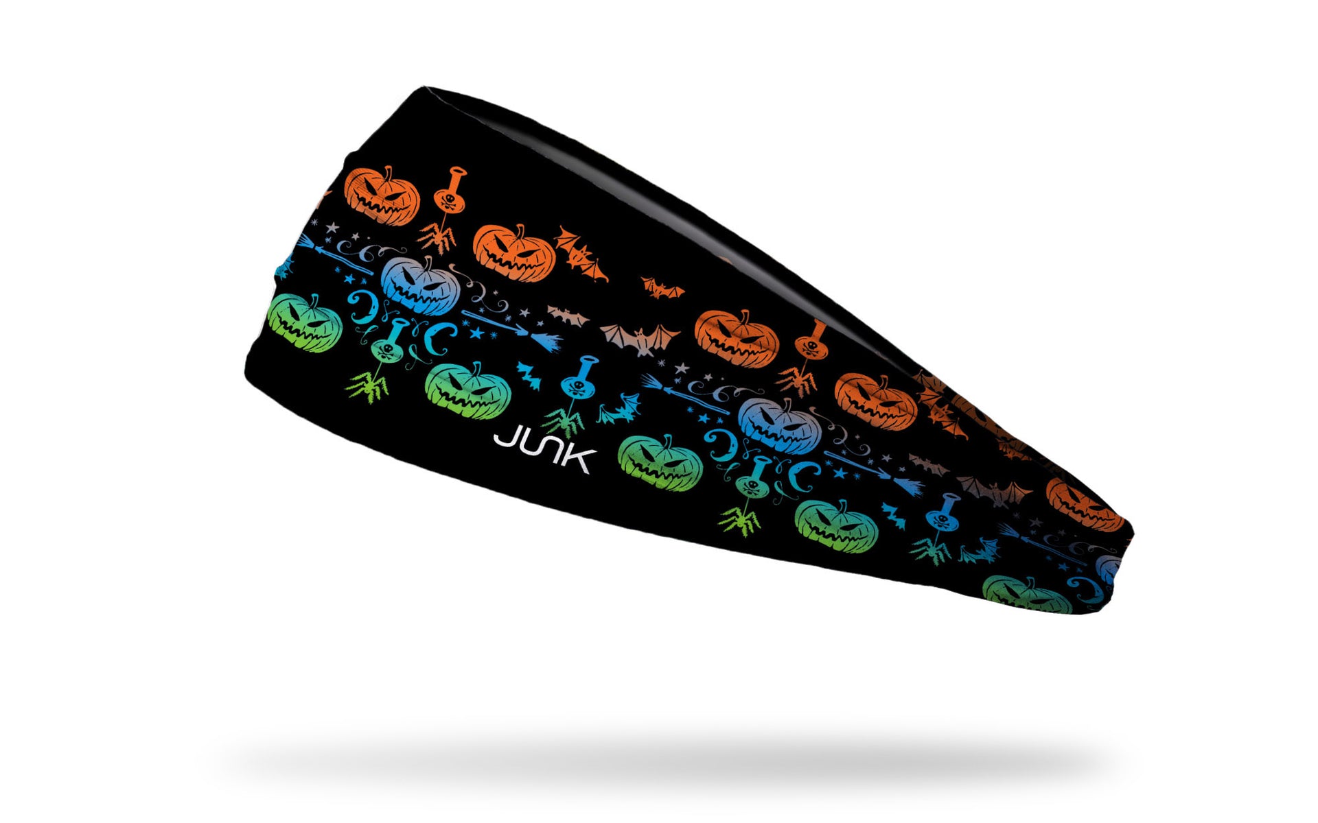 black headband with pattern of jack o lanterns, spiders, brooms, and potions in bright colors