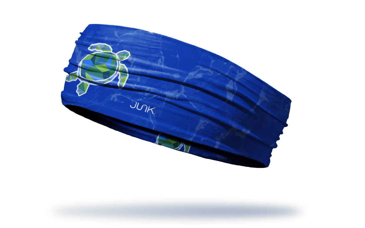 blue wave print headband with geometric sea turtle in center