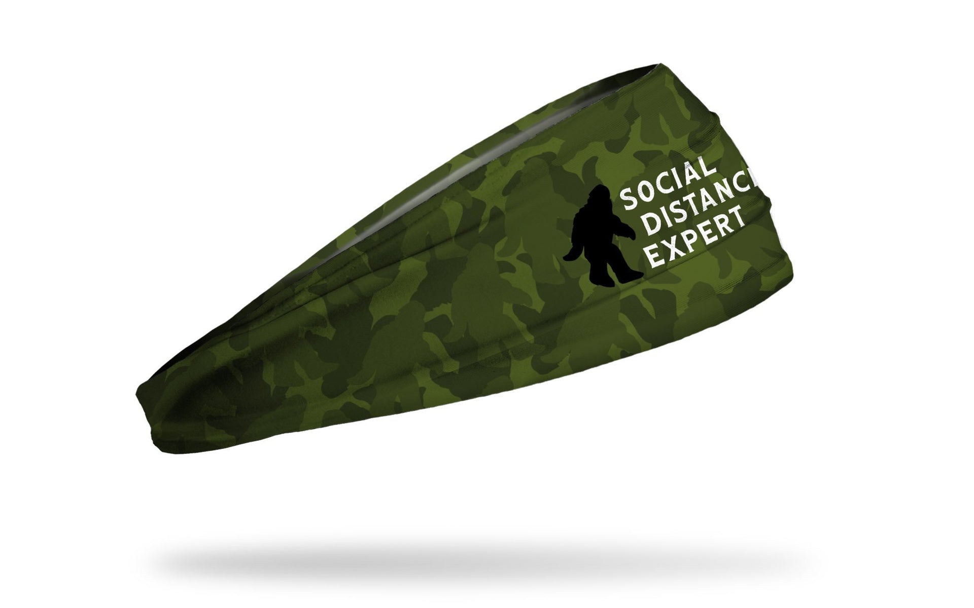 green camo headband with outline of bigfoot in black and social distancing expert in white on front center