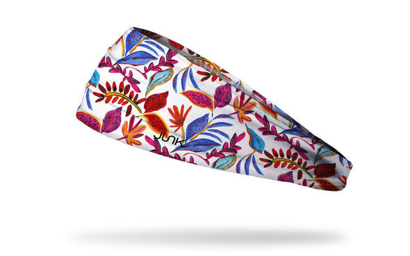 white headband with repeating colorful tropical floral and leaf pattern in pink blue red orange and yellow