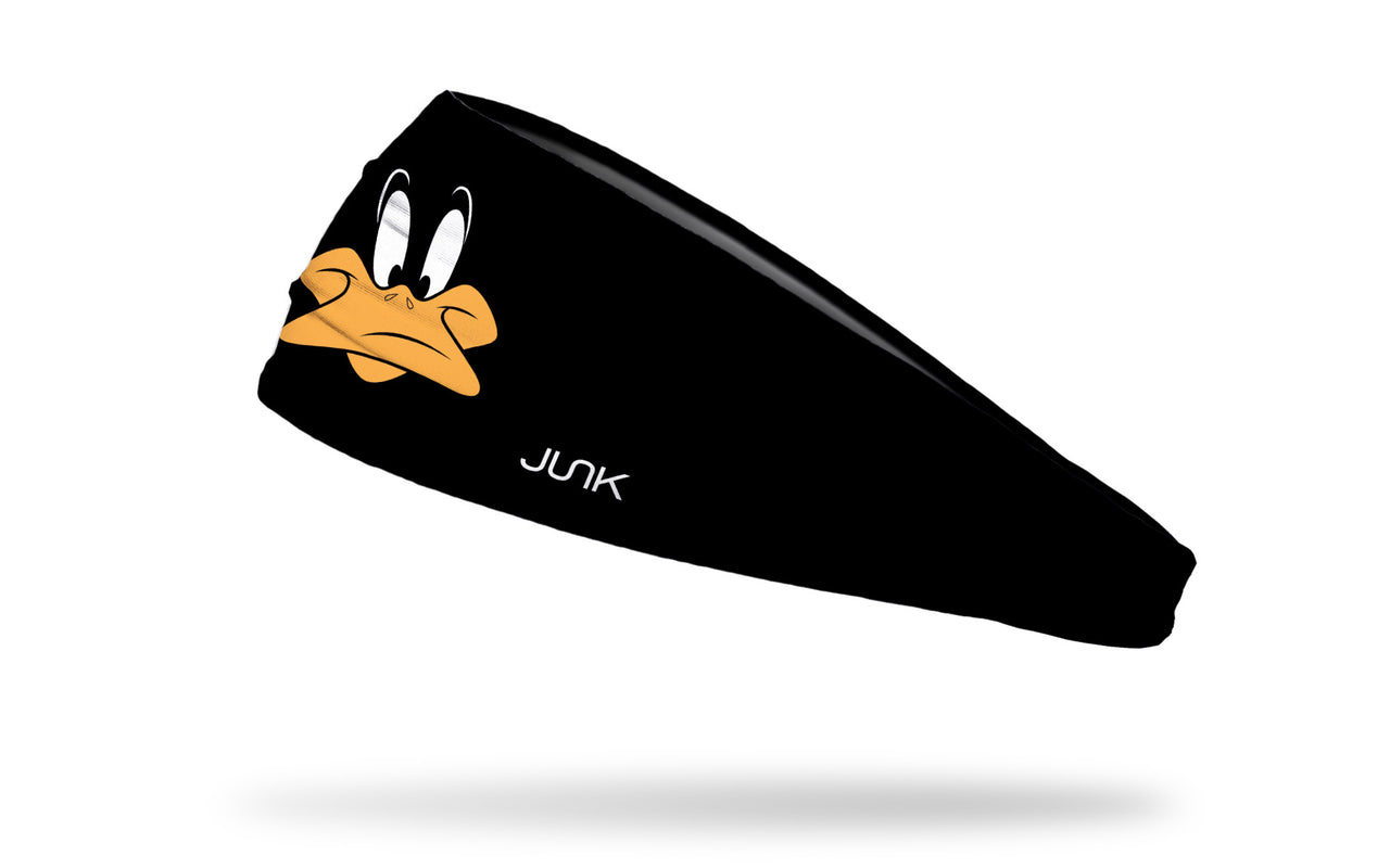 black headband with Looney Tunes Daffy Duck oversized face view design