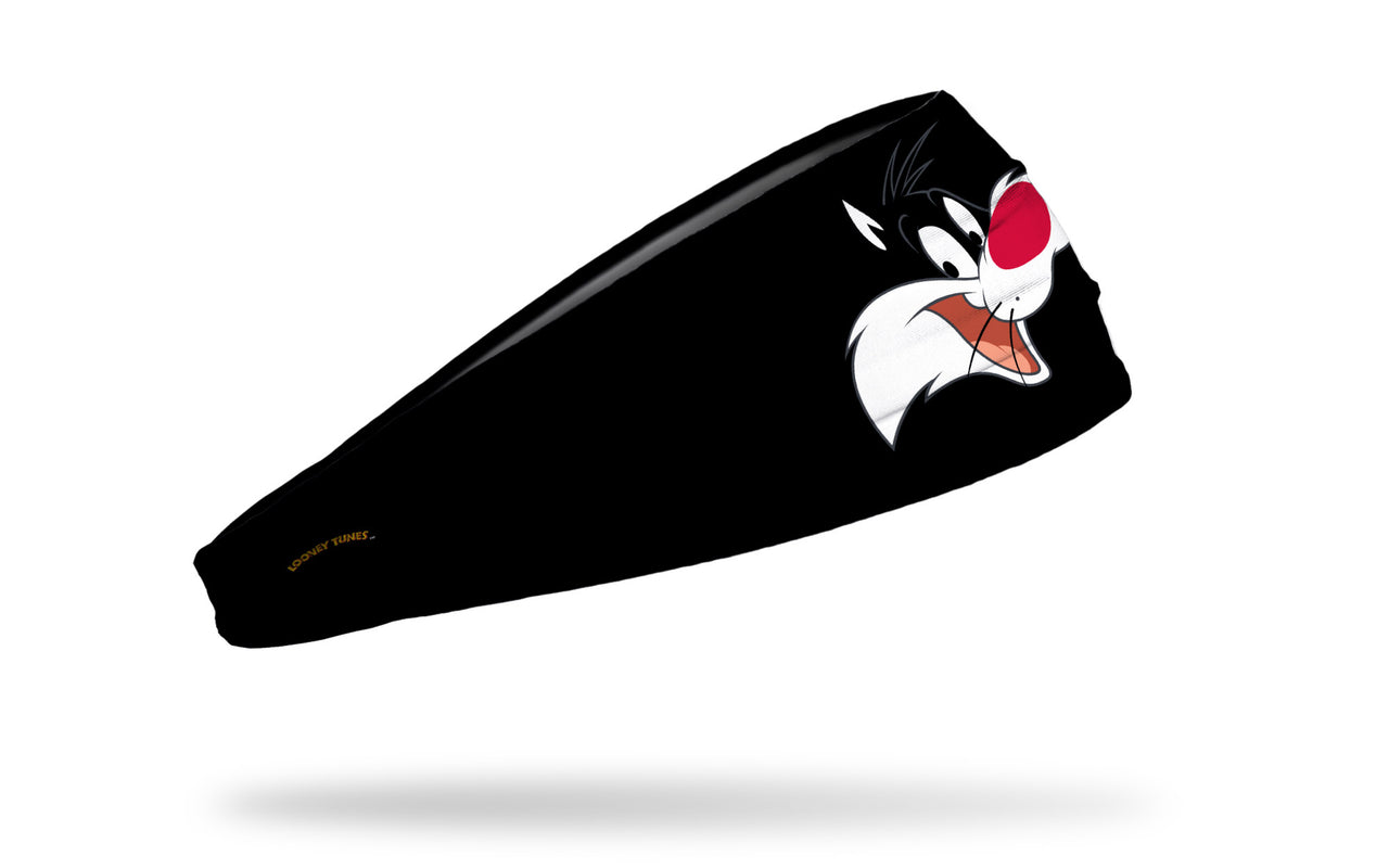 black headband with Looney Tunes Sylvester the cat oversized face view design