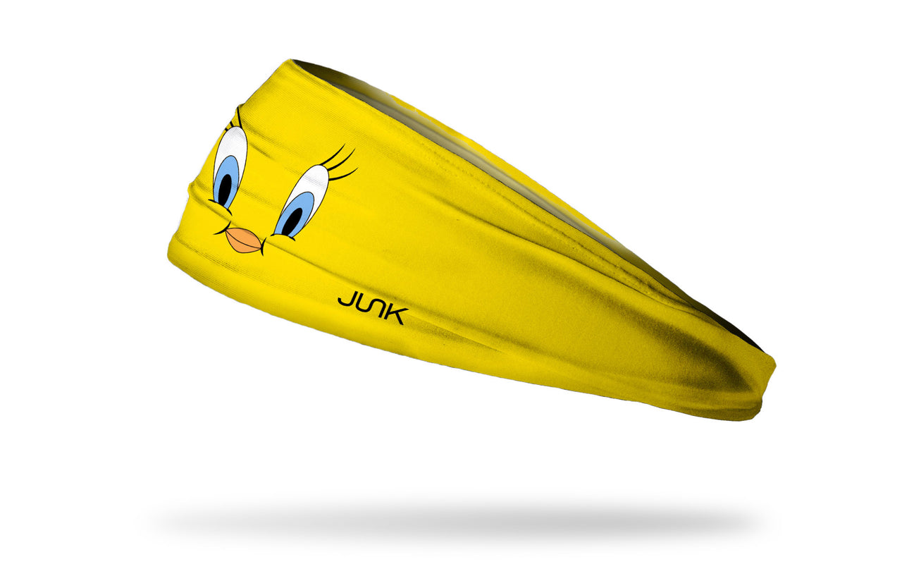 yellow headband with Looney Tunes Tweety Bird oversized face view design