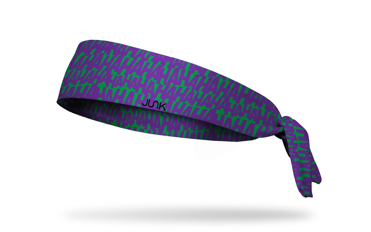 green headband with The Joker HAHA wordmark repeating in purple